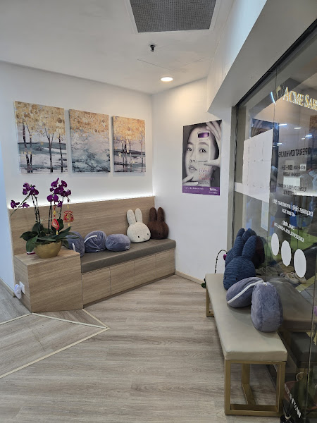 Kim's Dental Clinic cosy waiting area with plush toys and orchids